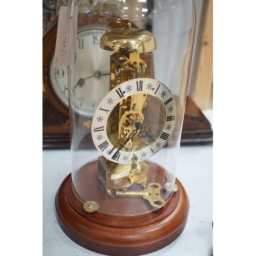 1359 - An early 20th century inlaid mahogany mantel clock, a skeleton clock under glass dome, a brass desk ... 