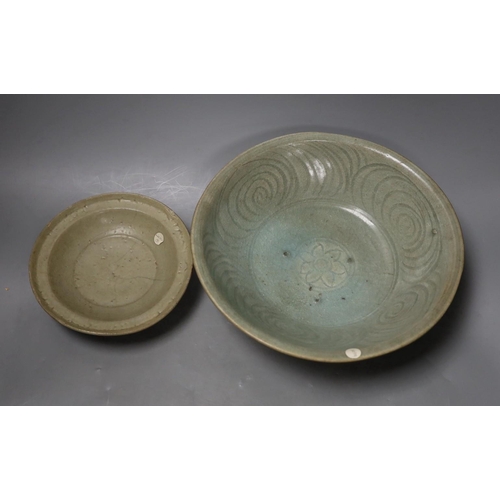 1362 - A Chinese celadon dish, probably Southern Song Dynasty, 17.5cm and a Thai Sawankhalok celadon deep d... 