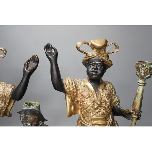 1366 - A pair of bronze blackamoor candlesticks and one other spelter figural candlestick, tallest 39cm... 