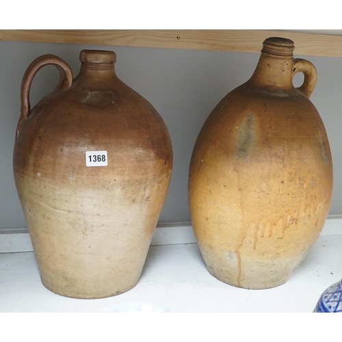 1368 - Two 19th century salt glazed stoneware flagons, tallest 44cm