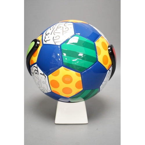 1374 - Romero Britto (Brazilian, 1963-), a ceramic football, 26cm