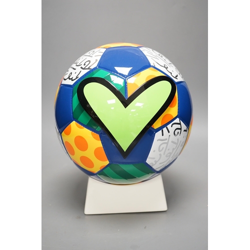 1374 - Romero Britto (Brazilian, 1963-), a ceramic football, 26cm