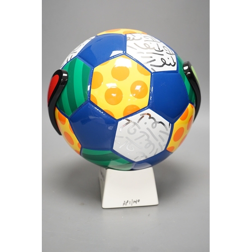 1374 - Romero Britto (Brazilian, 1963-), a ceramic football, 26cm