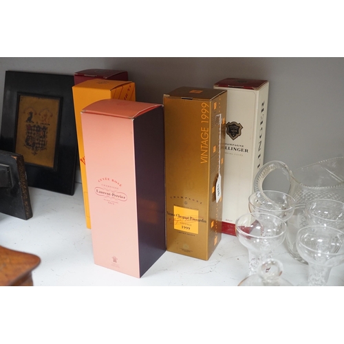 1376 - A boxed bottle of Veuve Clicquot 1999 vintage Champagne, a similar boxed NV Champagne, two boxed Bol... 