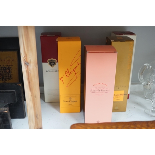 1376 - A boxed bottle of Veuve Clicquot 1999 vintage Champagne, a similar boxed NV Champagne, two boxed Bol... 