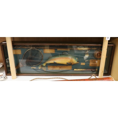 1402 - A cased fishing display case of a Rainbow Trout centred around angling ephemera, 106 x 34cm