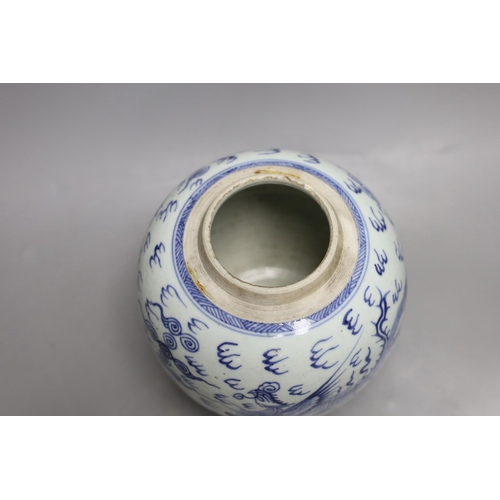 1404 - An 18th century Chinese provincial blue and white dragon and phoenix jar, 20cm high Provenance- the ... 