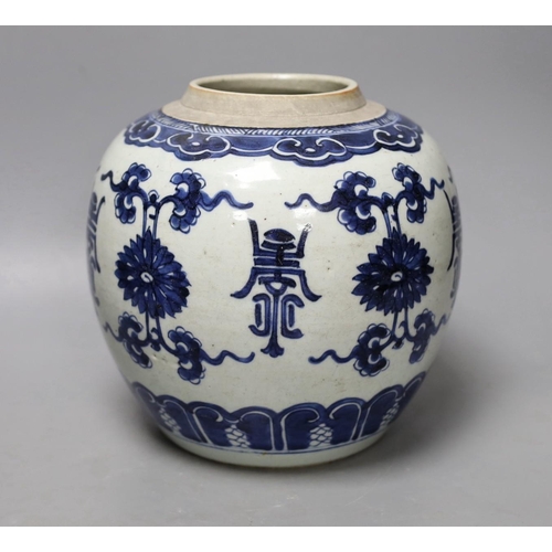 1409 - An 18th century Chinese blue and white jar, painted with shou, flowers and tendrils, 22cm high Pro... 