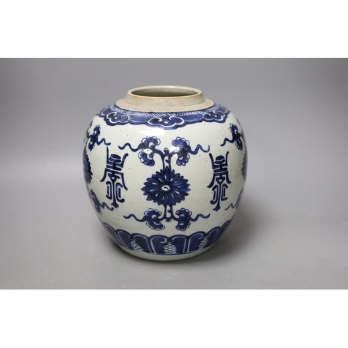 1409 - An 18th century Chinese blue and white jar, painted with shou, flowers and tendrils, 22cm high Pro... 