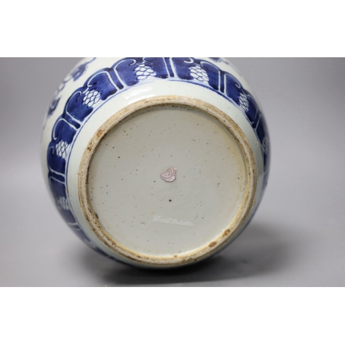 1409 - An 18th century Chinese blue and white jar, painted with shou, flowers and tendrils, 22cm high Pro... 