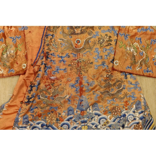 1410 - A Chinese embroidered silk dragon robe, late Qing Dynasty