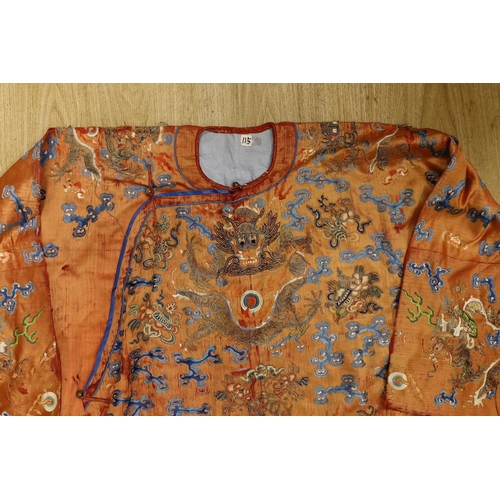 1410 - A Chinese embroidered silk dragon robe, late Qing Dynasty