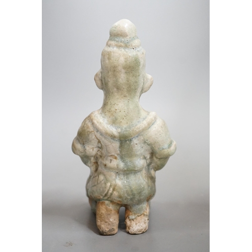 1449 - A Thai celadon Buddhist figure, Si Satchanalai, c.1450-1599, 18cms high Provenance- collected by the... 