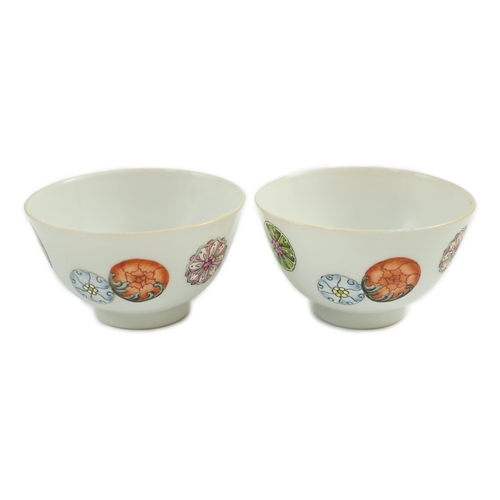 1466 - A pair of Chinese enamelled porcelain tea bowls, Qianlong seal marks,  7cms diameter