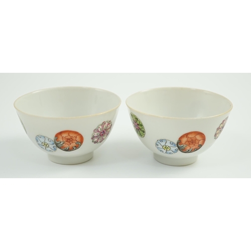 1466 - A pair of Chinese enamelled porcelain tea bowls, Qianlong seal marks,  7cms diameter