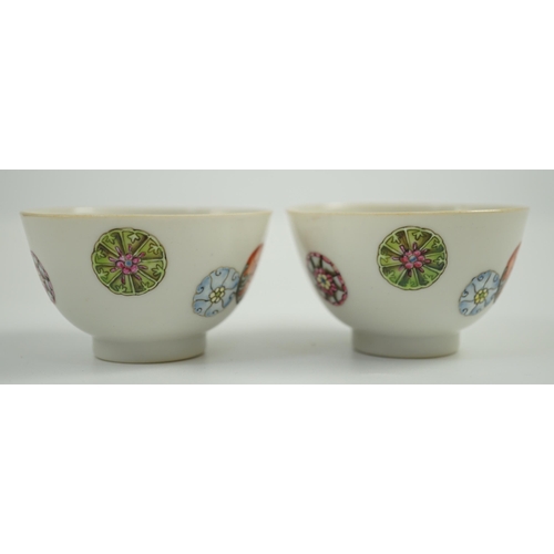 1466 - A pair of Chinese enamelled porcelain tea bowls, Qianlong seal marks,  7cms diameter