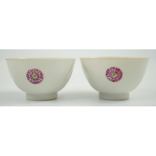 1466 - A pair of Chinese enamelled porcelain tea bowls, Qianlong seal marks,  7cms diameter