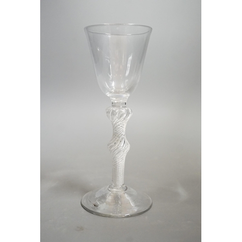 1473 - A mid 18th century double knop airtwist wine glass, 16cms high