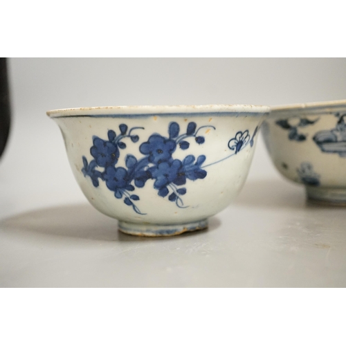 1477 - Three Chinese late Ming blue and white bowls, one painted with figures in a boat on horseback and in... 