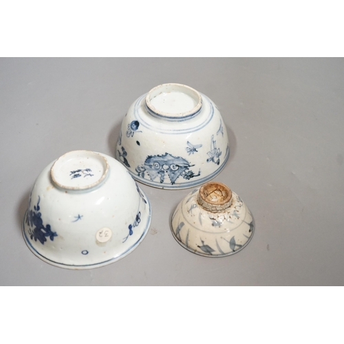 1477 - Three Chinese late Ming blue and white bowls, one painted with figures in a boat on horseback and in... 