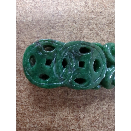 1493 - A Chinese Jadeite carving of two cash and a chilong, 3.7cm