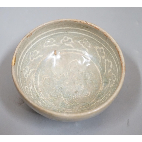 1511 - A Korean slip decorated celadon small bowl, Koryo dynasty. 10cm diameter Provenance- collected by th... 