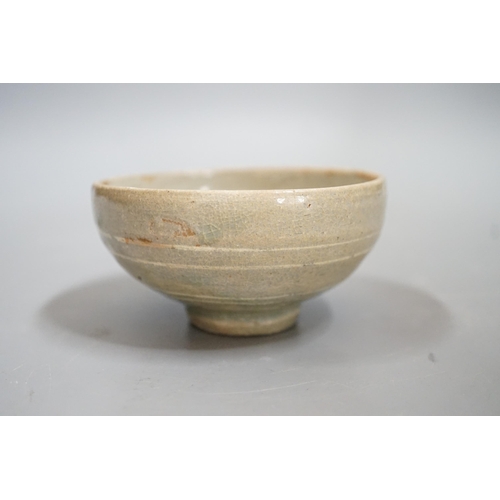 1511 - A Korean slip decorated celadon small bowl, Koryo dynasty. 10cm diameter Provenance- collected by th... 