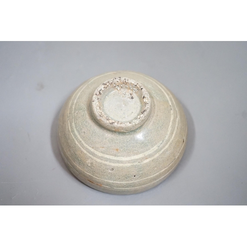 1511 - A Korean slip decorated celadon small bowl, Koryo dynasty. 10cm diameter Provenance- collected by th... 