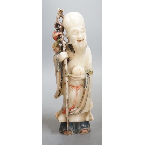 1519 - An 18th century Chinese carved soapstone figure of Shao Lou on carved hardwood stand. 24cm high (a.f... 