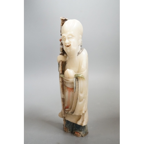 1519 - An 18th century Chinese carved soapstone figure of Shao Lou on carved hardwood stand. 24cm high (a.f... 