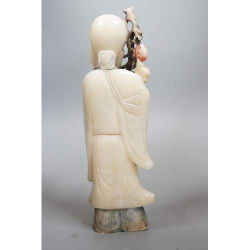 1519 - An 18th century Chinese carved soapstone figure of Shao Lou on carved hardwood stand. 24cm high (a.f... 