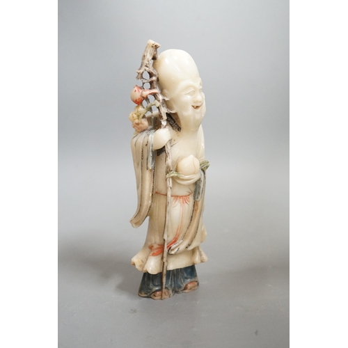 1519 - An 18th century Chinese carved soapstone figure of Shao Lou on carved hardwood stand. 24cm high (a.f... 