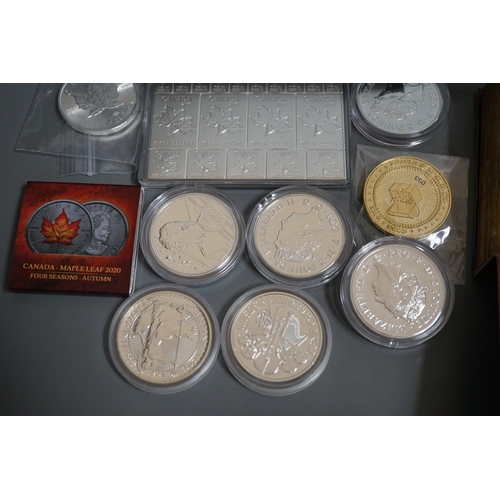 1522 - Ten bullion silver 1oz. commemorative coins, a bullion silver 2oz. coin and a Canada 2oz. silver ing... 