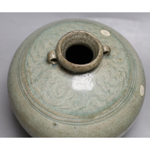 1553 - A Thai Sawankhalok green glazed ring handled jar, 15th century Provenance- collected by the vendors... 