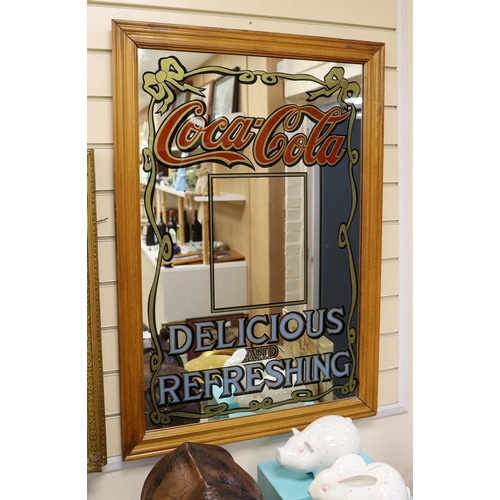 1578 - A beech framed Coca Cola advertising mirror, 96 x 65cm total