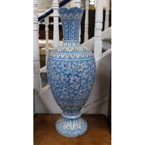 1583 - A large Persian fritware floral decorated vase, 67cm tall