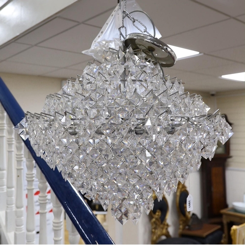 1586 - A ten tier, eighteen light, graduated chrome chandelier, with diamond shaped clear perspex drops... 