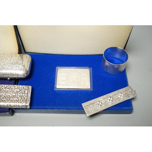 1809 - Small silver items including two napkin rings, a modern cased commemorative plaque and replica stamp... 