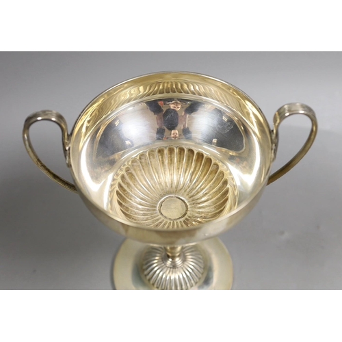 1832 - An Edwardian demi fluted silver two handled trophy cup, by Mappin & Webb, Sheffield, 1901, with late... 