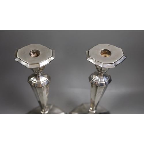 1834 - A pair of North American sterling candlesticks, with panelled stems and shaped oval bases, 34.1cm, w... 