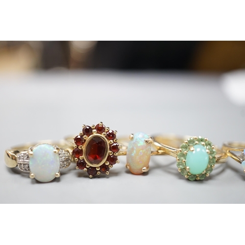 1875 - Five assorted modern 9ct gold and gem set dress rings, including white opal and diamond chip cluster... 