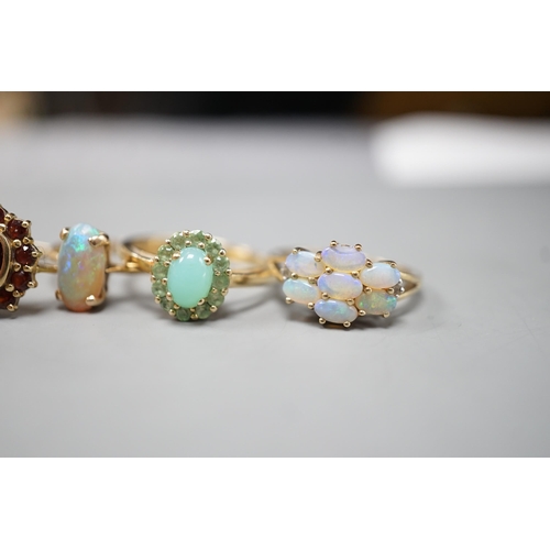 1875 - Five assorted modern 9ct gold and gem set dress rings, including white opal and diamond chip cluster... 