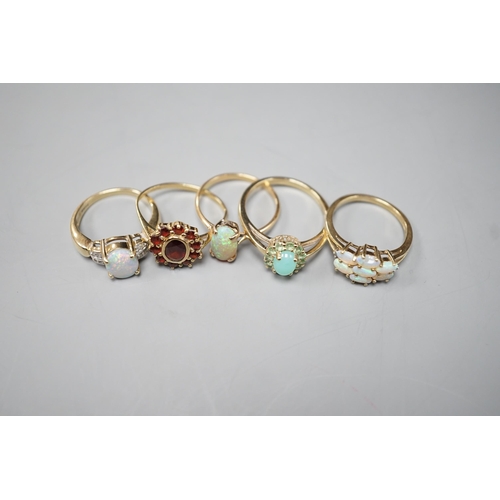 1875 - Five assorted modern 9ct gold and gem set dress rings, including white opal and diamond chip cluster... 