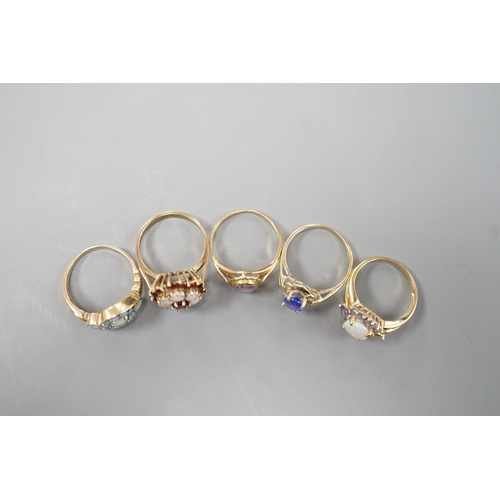 1876 - Five assorted modern 9ct gold and gem set dress rings, including, white opal cluster, garnet and whi... 