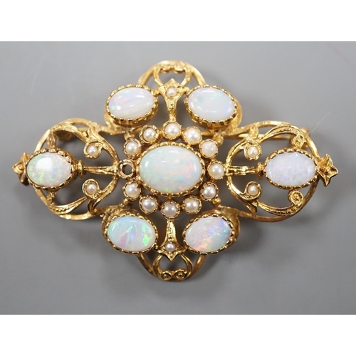 1887 - An early 1970's 9ct gold, graduated oval white opal and split pearl set brooch, of quatrefoil shape ... 