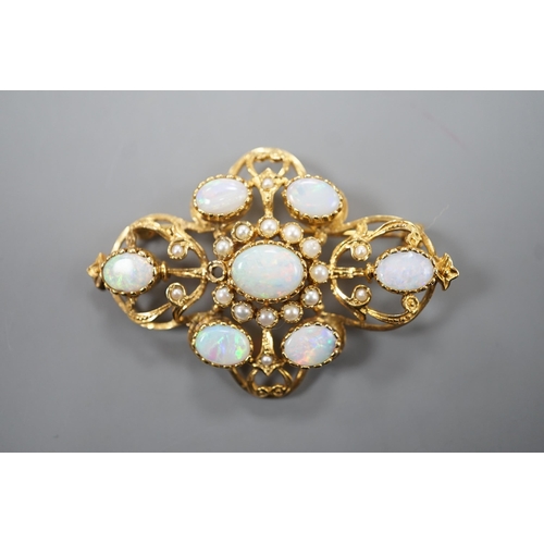 1887 - An early 1970's 9ct gold, graduated oval white opal and split pearl set brooch, of quatrefoil shape ... 