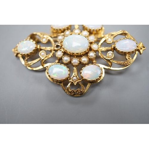 1887 - An early 1970's 9ct gold, graduated oval white opal and split pearl set brooch, of quatrefoil shape ... 