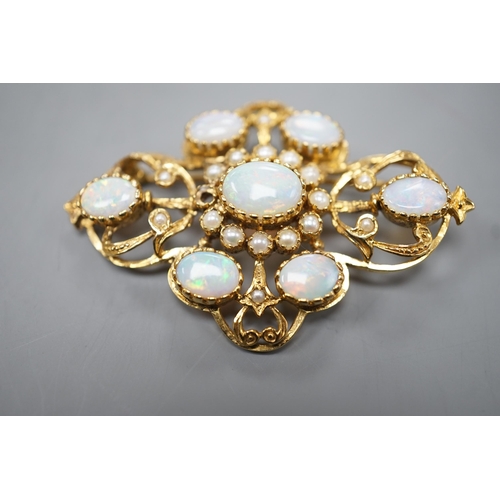 1887 - An early 1970's 9ct gold, graduated oval white opal and split pearl set brooch, of quatrefoil shape ... 