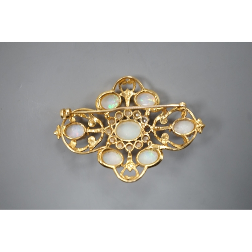 1887 - An early 1970's 9ct gold, graduated oval white opal and split pearl set brooch, of quatrefoil shape ... 