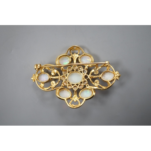 1887 - An early 1970's 9ct gold, graduated oval white opal and split pearl set brooch, of quatrefoil shape ... 